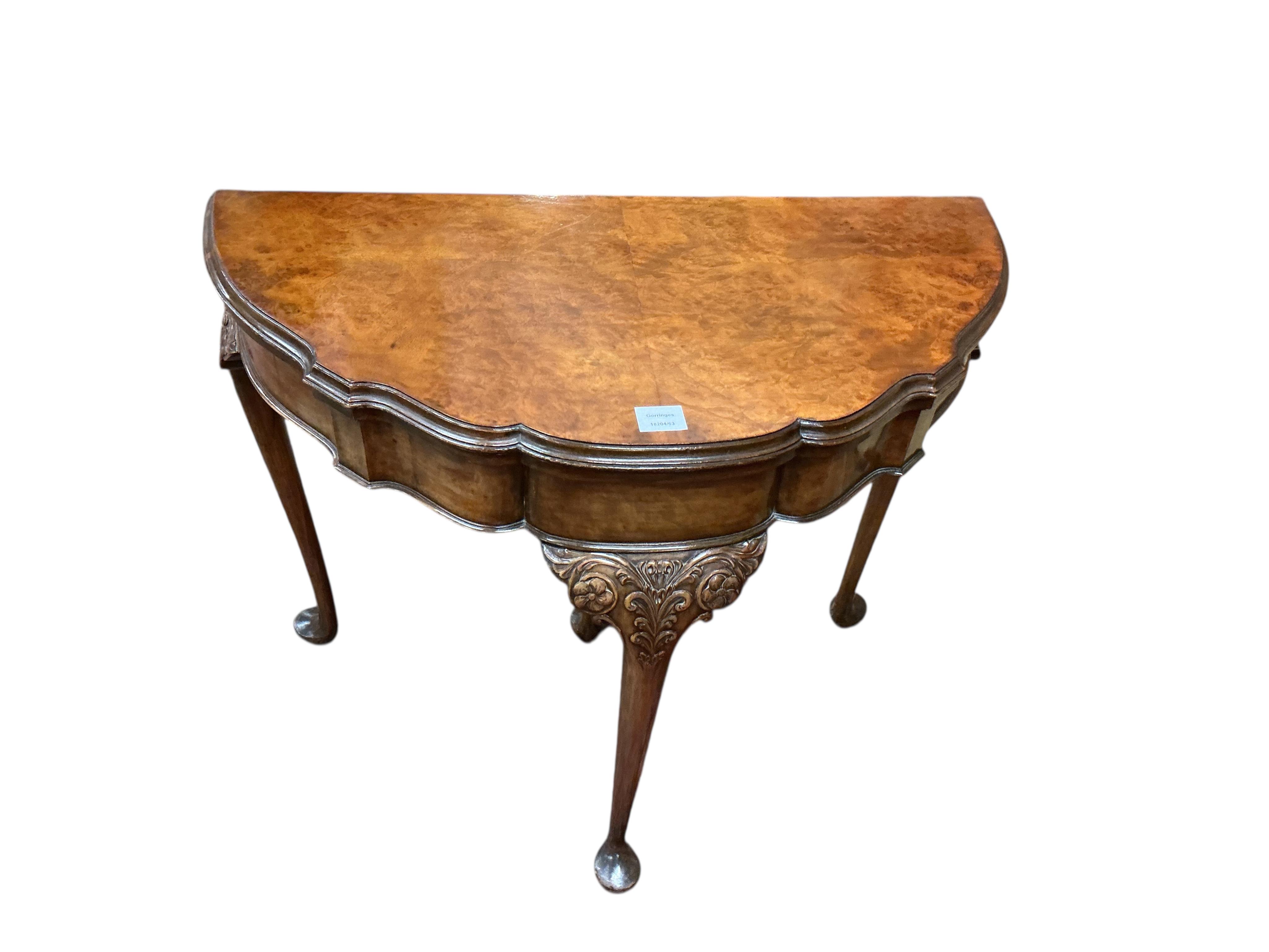 A Queen Anne Revival walnut folding card table, width 88cm, depth 44cm, height 74cm